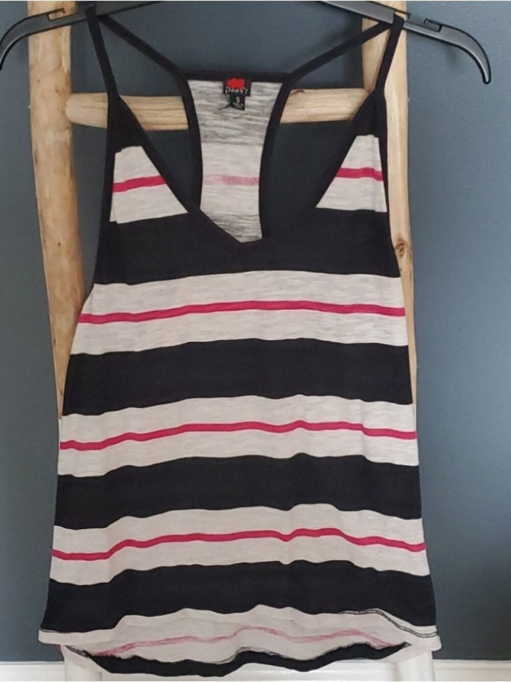 black, white, and pink striped racerback tank top.
